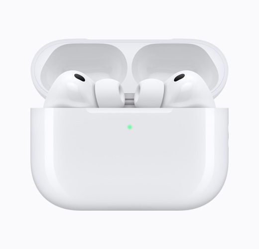 AirPods 4 inside an open white charging case