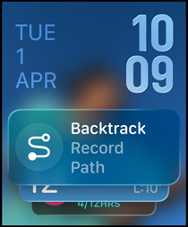 Three Apple Watch models, center in Natural color, face shows Smart Stack with Backtrack widget, right in Jet Black, face shows Workout screen, left in Rose Gold, face with Sleep score