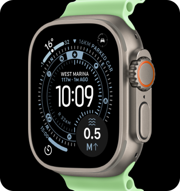 Apple Watch Ultra 3 with a silver titanium case and Green Loop strap.