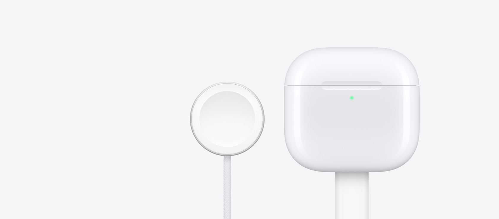 AirPods 4 şarj kutusu, Apple Watch şarj aygıtıyla birlikte gösteriliyor.