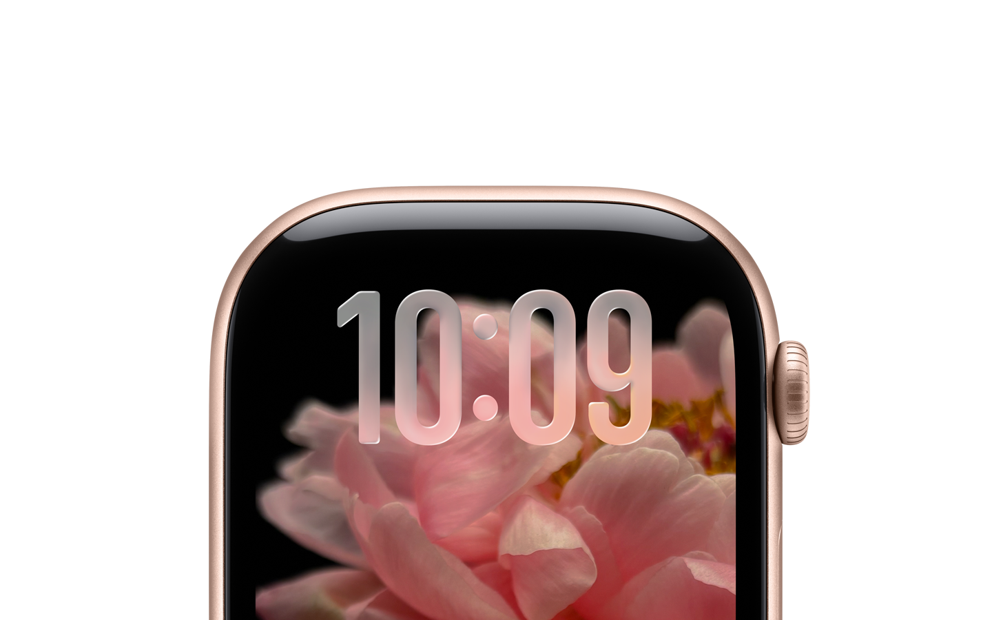 Růžově zlaté Apple Watch bez řemínku, pohled jen na horní část displeje, nahoře je digitální čas vyvedený designem Liquid Glass