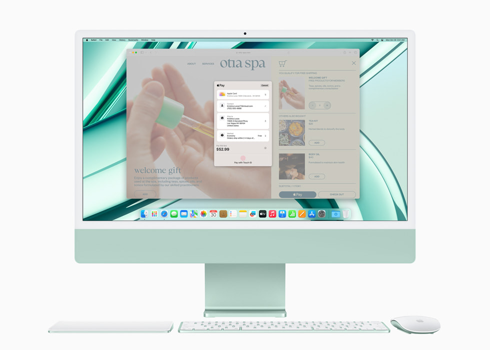 Apple Pay vises på nye iMac med M3-chip i grønn med styreflate, tastatur og mus i matchende farge.