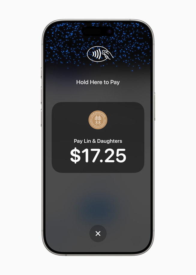 På iPhone 16 Pro bliver en bruger bedt om at bruge Tap to Pay på iPhone til at betale en forhandler ved navn Lin & Daughters, og forhandlerens logo vises på skærmen.