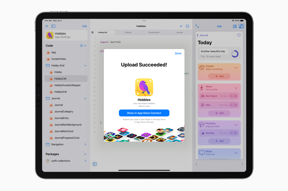 App Store에 업로드되는 앱을 보여주는 12.9형 iPad Pro.
