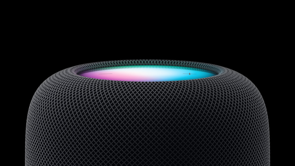 Twee HomePods (2e generatie) tegen een zwarte achtergrond.