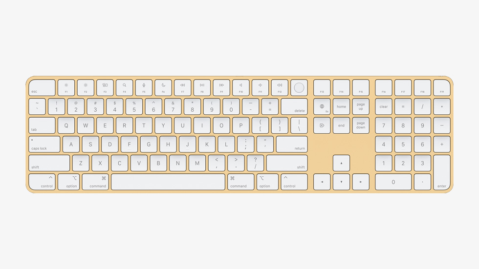 Touch ID özellikli ve Sayısal Tuş Takımlı sarı bir Magic Keyboard.