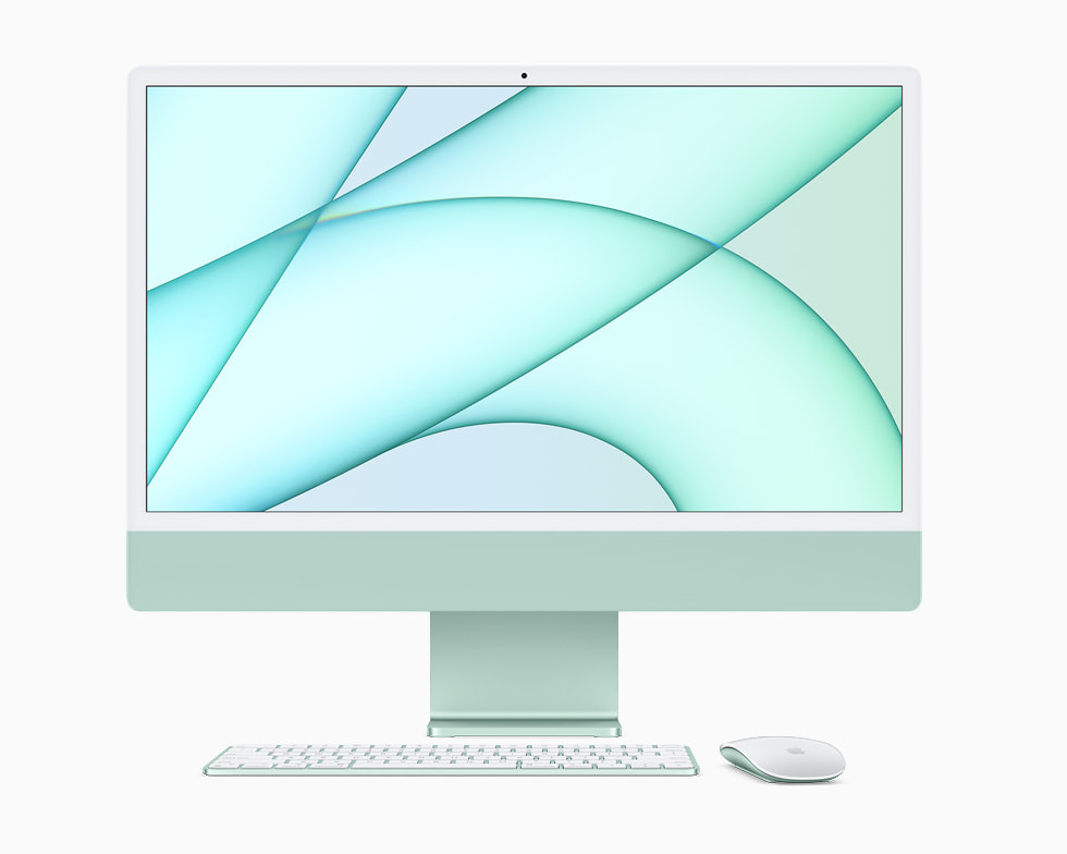 Magic Keyboard ve Magic Mouse ile görüntülenen yeşil bir iMac.