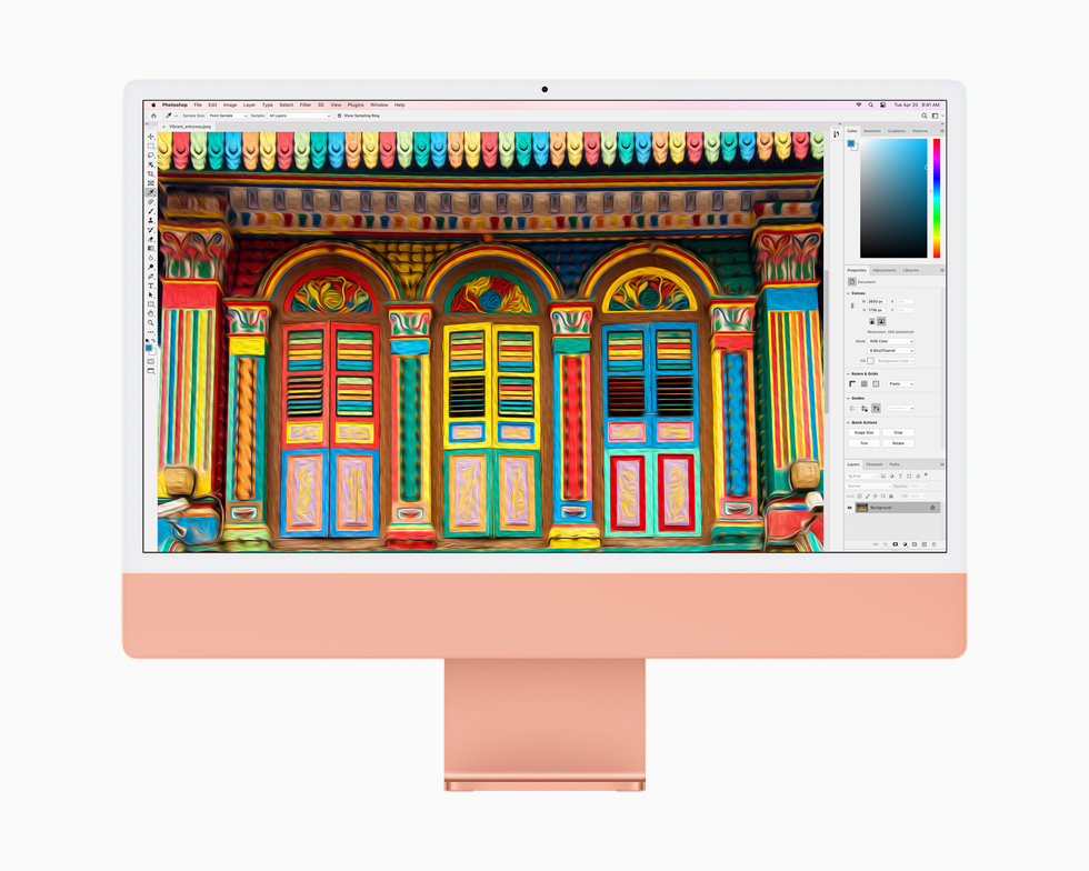 Turuncu bir iMac’te gösterilen, Photoshop’ta düzenlenmiş bir fotoğraf.
