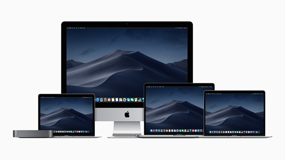 Portables Mac de différentes tailles aux côtés du nouveau Mac mini en gris sidéral et d’un Mac de bureau. 