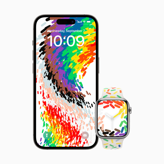 Le nouveau fond d’écran iOS Célébration de la fierté affiché sur iPhone 14 Pro, et le bracelet édition Fierté et le cadran assorti sur Apple Watch Series 8. 